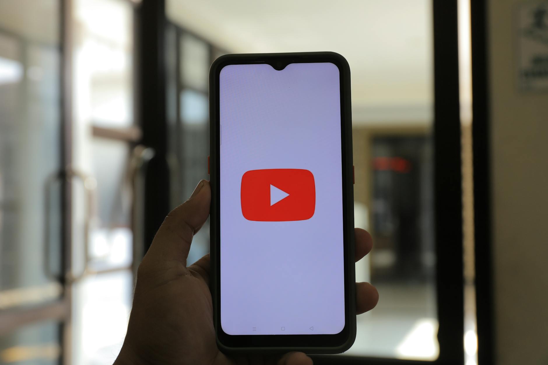 a smartphone with a logo of youtube