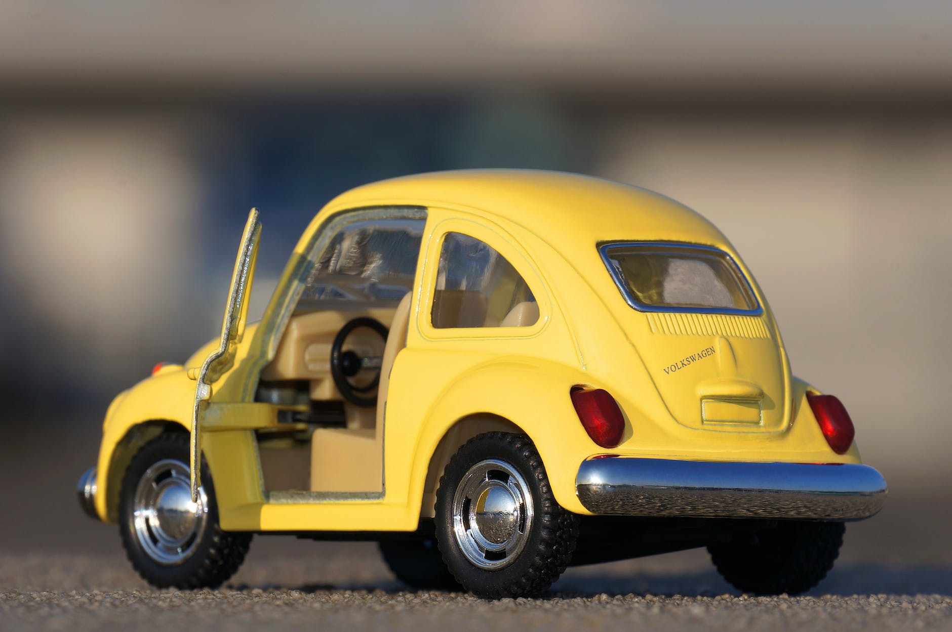 yellow volkswagen beetle die cast on floor